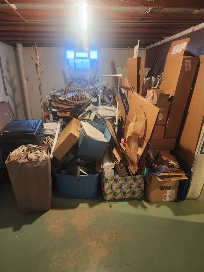 Roll-off dumpster container at job site for Roll Off Dumpster Rental in Lake Hallie